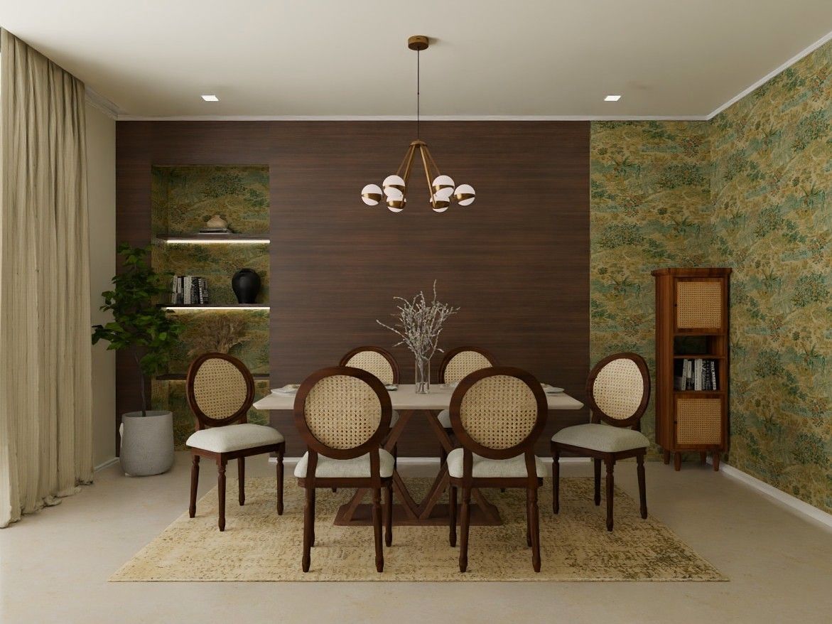 Stylish dining room featuring cane-back chairs, a gold chandelier, and botanical wallpaper - Beautiful Homes