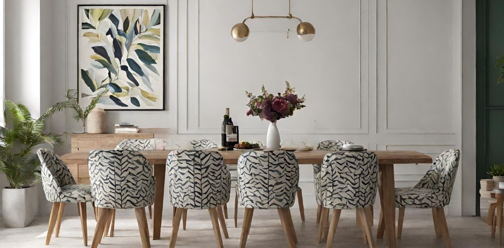 Modern dining room with wall trims and printed upholstered chairs - Beautiful Homes