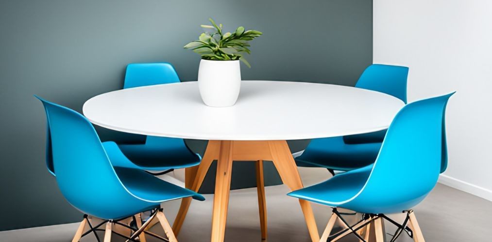 White dining table with blue plastic chairs-Beautiful Homes