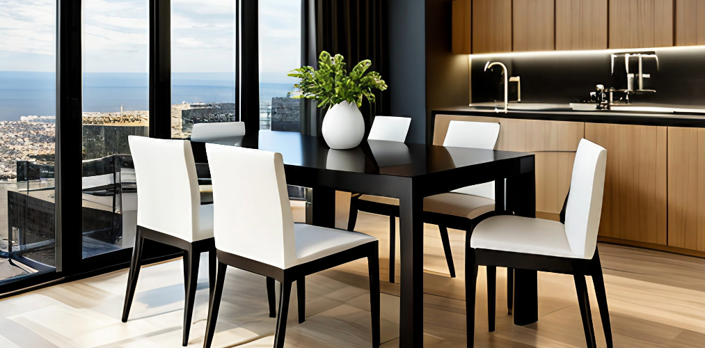Simple dining room with black table and white chairs-Beautiful Homes