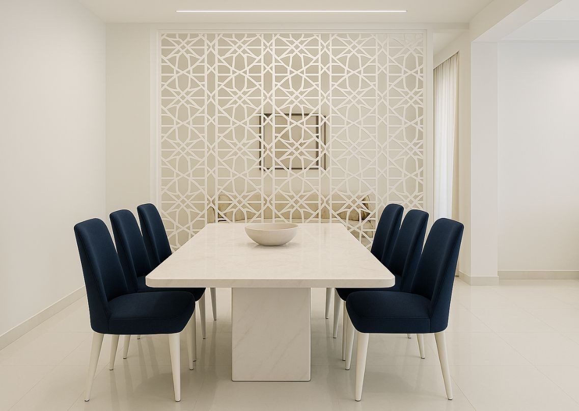 Dining room with white marble table and navy chairs - Beautiful Homes