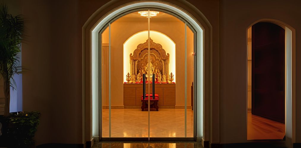 Arched glass door for pooja room - Beautiful Homes