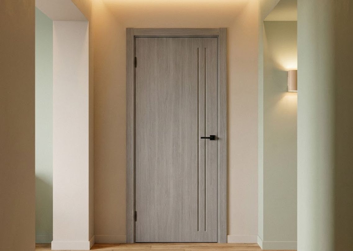 Light gray door with black handle and soft lighting - Beautiful Homes
