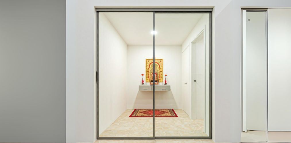 Modern glass sliding door for pooja room - Beautiful Homes