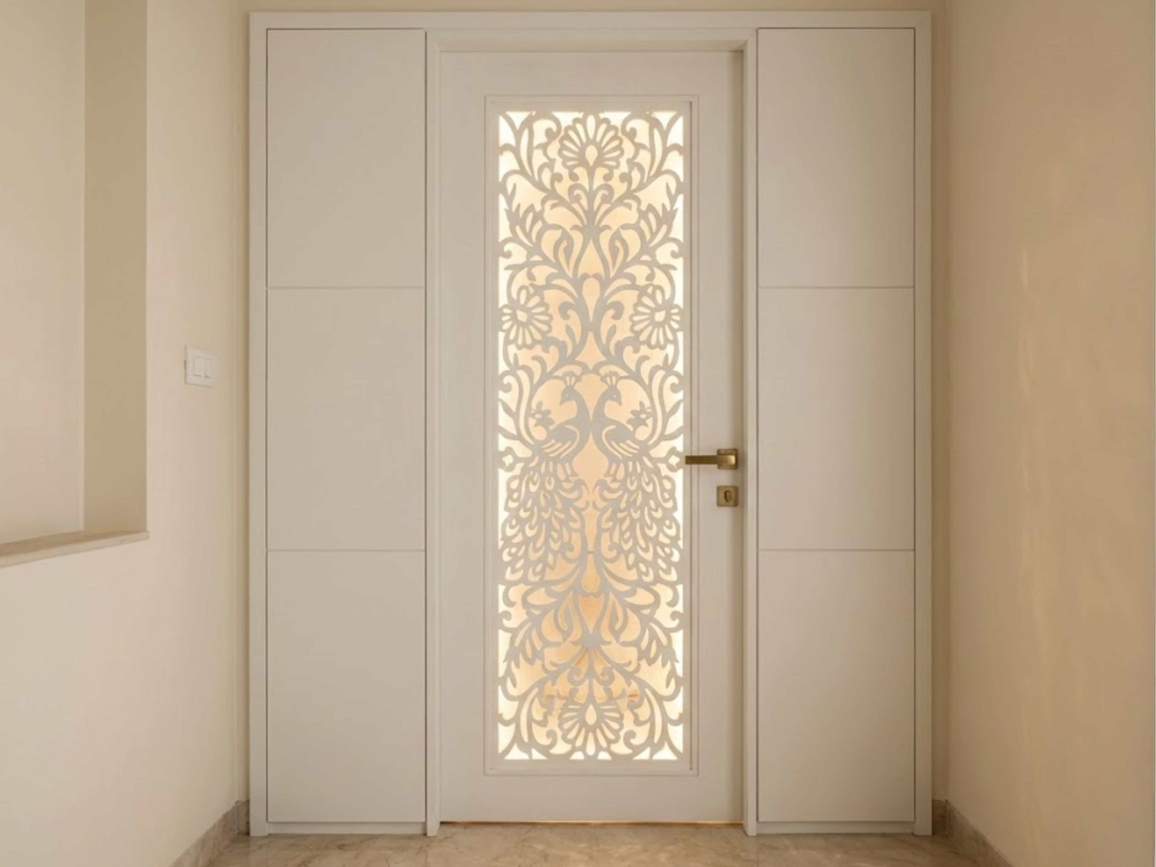 White door with floral pattern and gold handle - Beautiful Homes