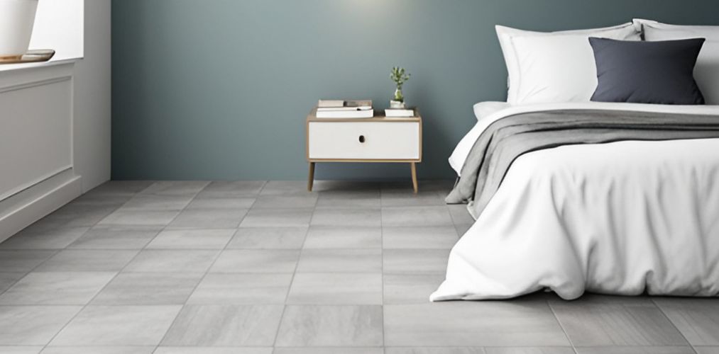 Grey flooring design with tiles for bedroom-Beautiful Homes