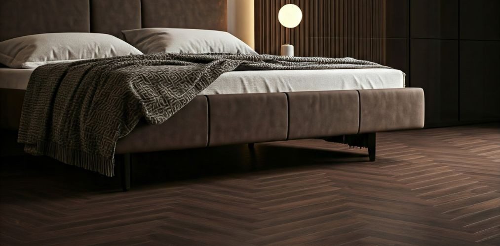 Dark herringbone wooden flooring in luxury bedroom - Beautiful Homes