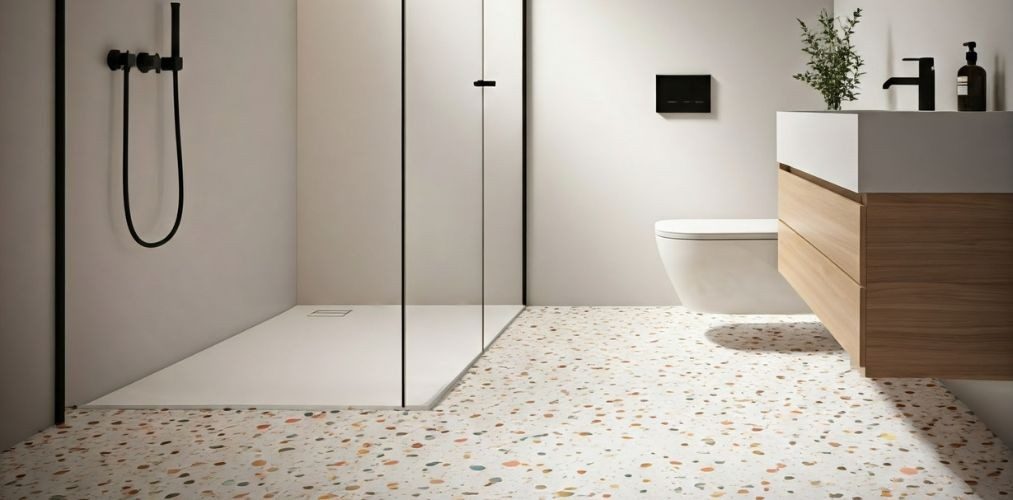 Bathroom with colourful terrazzo flooring and wooden vanity - Beautiful Homes