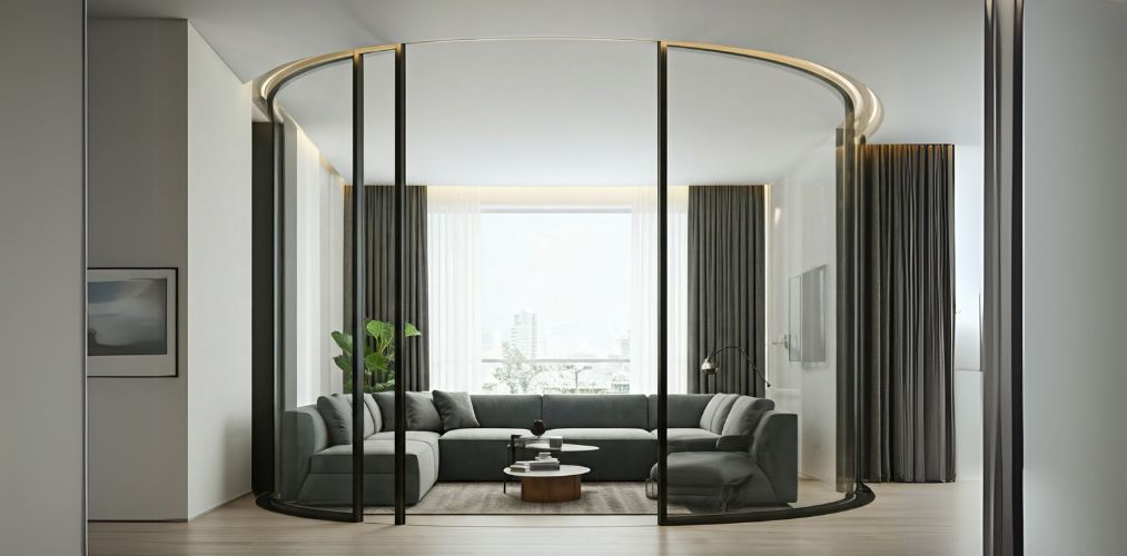 Curved glass wall partition in living space - Beautiful Homes