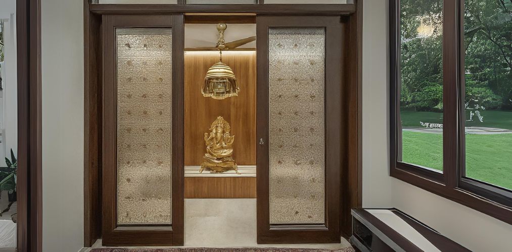 Ornamental glass pooja room door design - Beautiful Homes