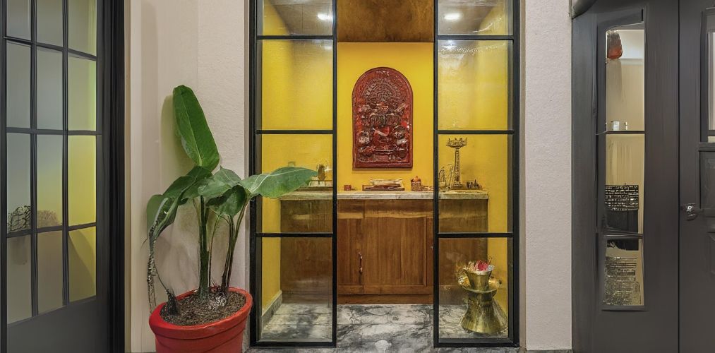 Simple clear glass enclosed pooja room - Beautiful Homes