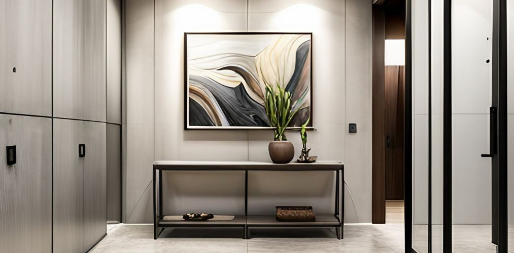 Foyer area design with concrete walls and metal console table-Beautiful Homes