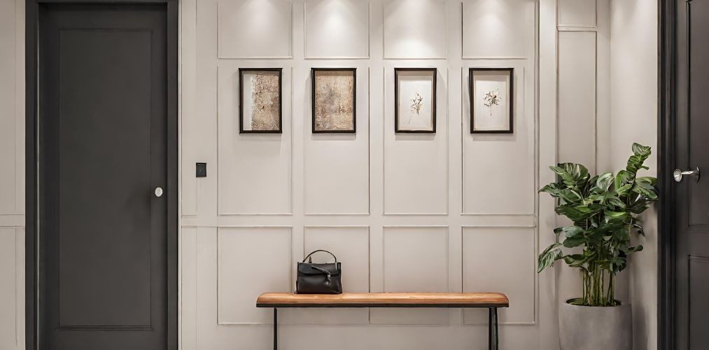 Foyer with a decorative white wall and a wooden bench - Beautiful Homes