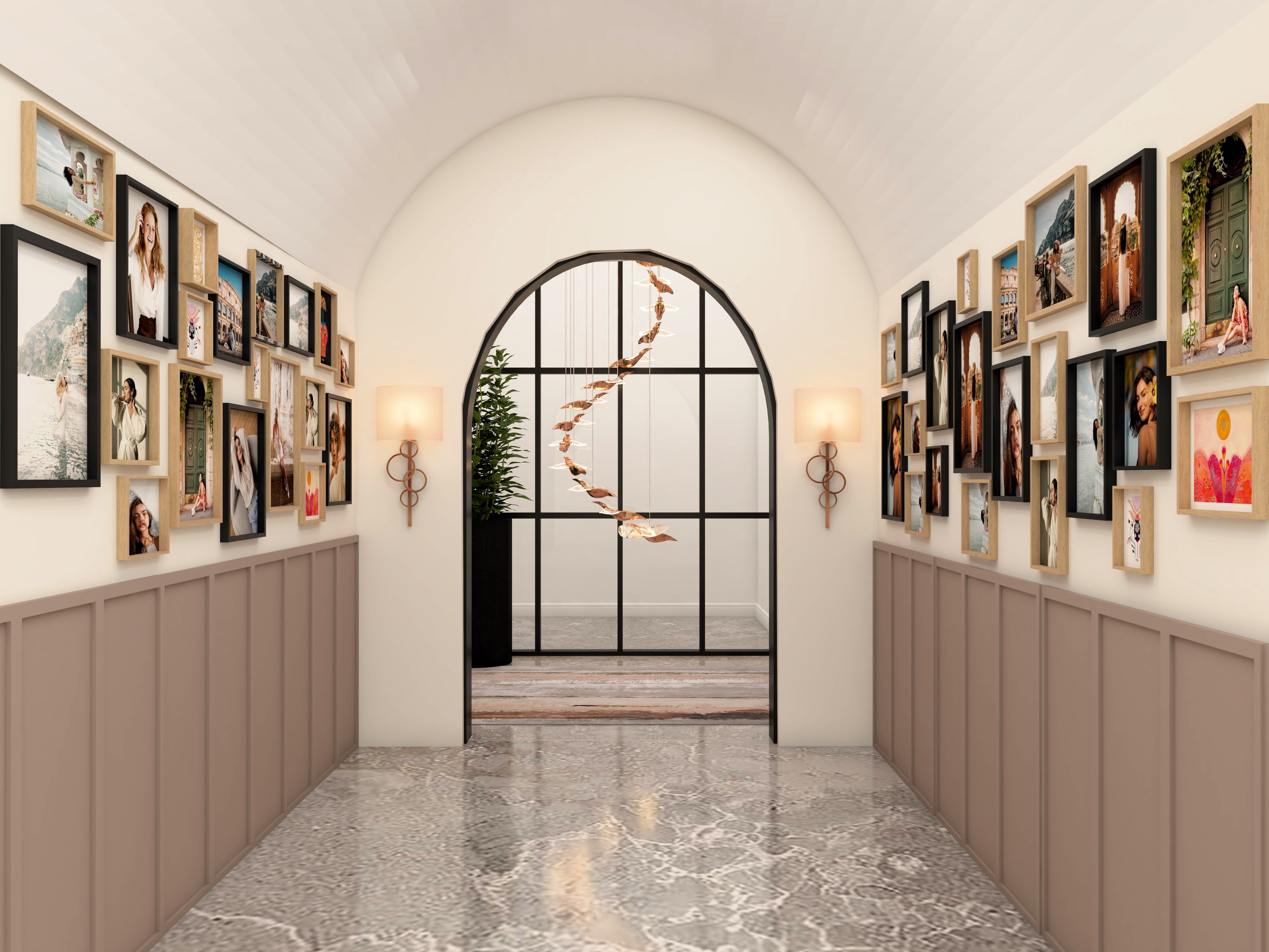 White and beige foyer area with gallery wall and arched glass door