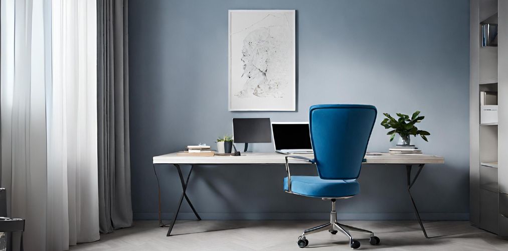 Home office with metal table and blue swivel chair - Beautiful Homes