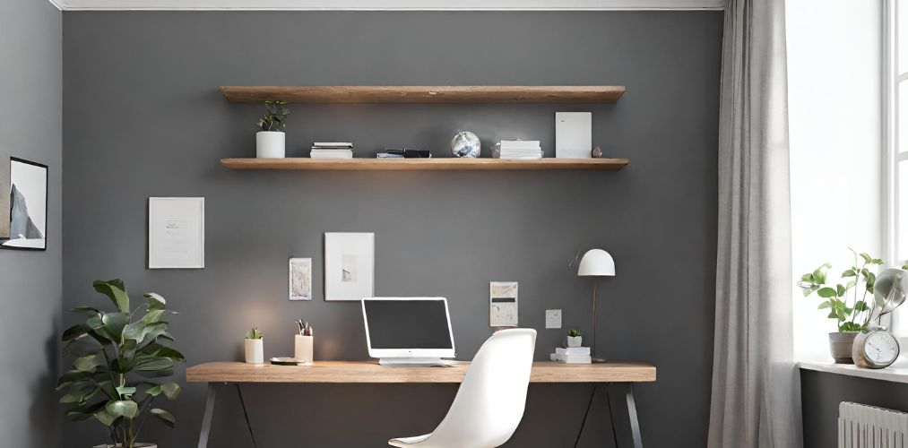 Simple home office with white office chair and grey accent wall-Beautiful Homes