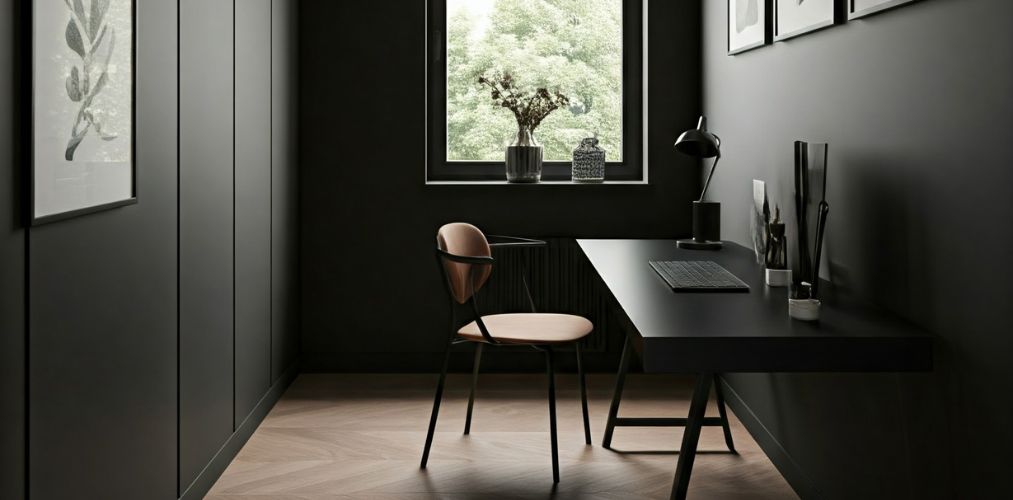 Modern study room with black walls and wooden desk - Beautiful Homes
