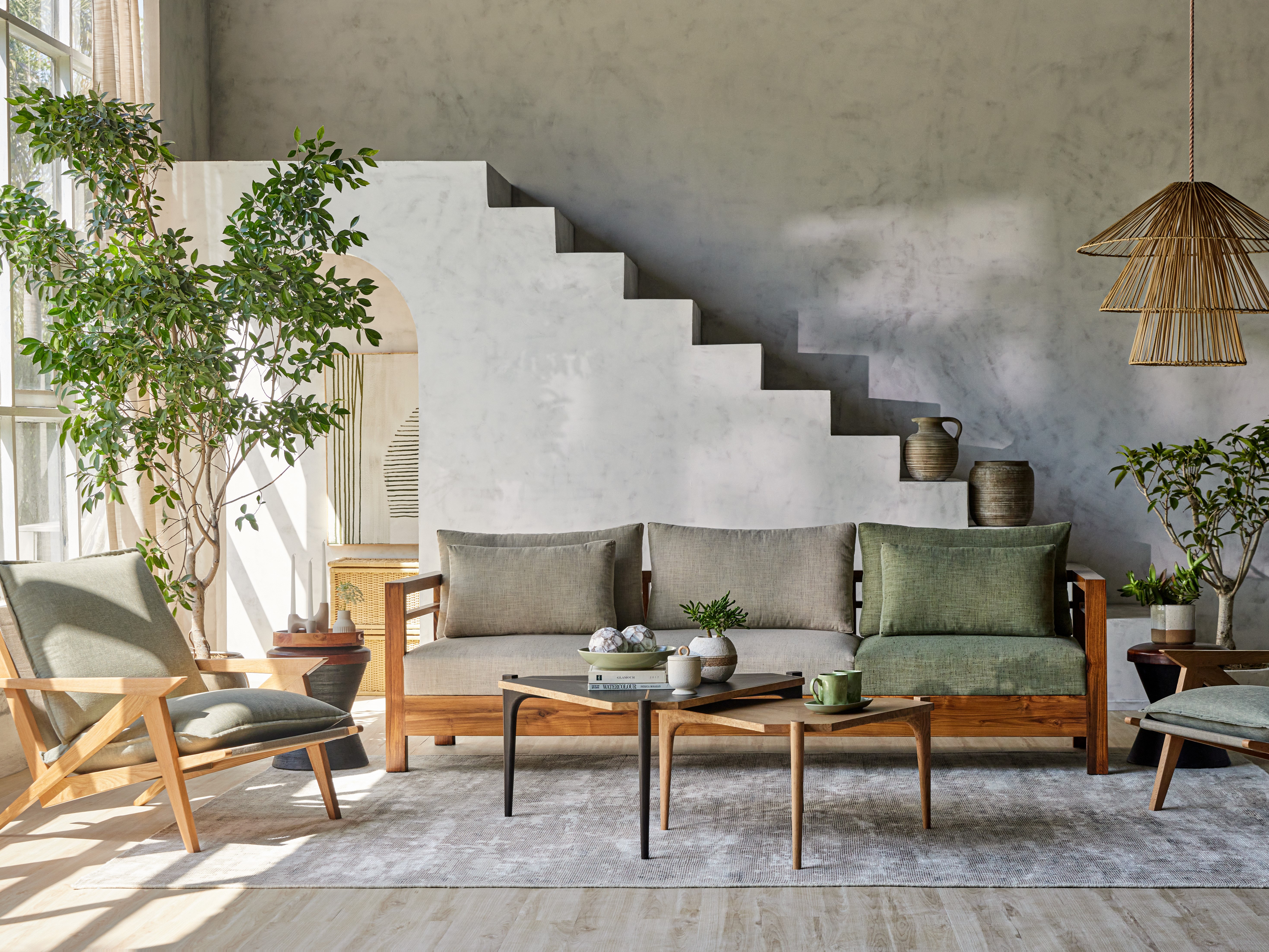 Modern living room with wooden furniture and plants - Beautiful Homes