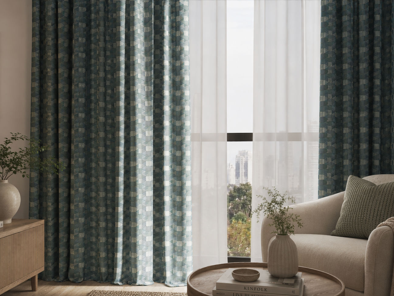 Floor-length teal and blue-grey curtains with an intricate geometric pattern - Beautiful Homes