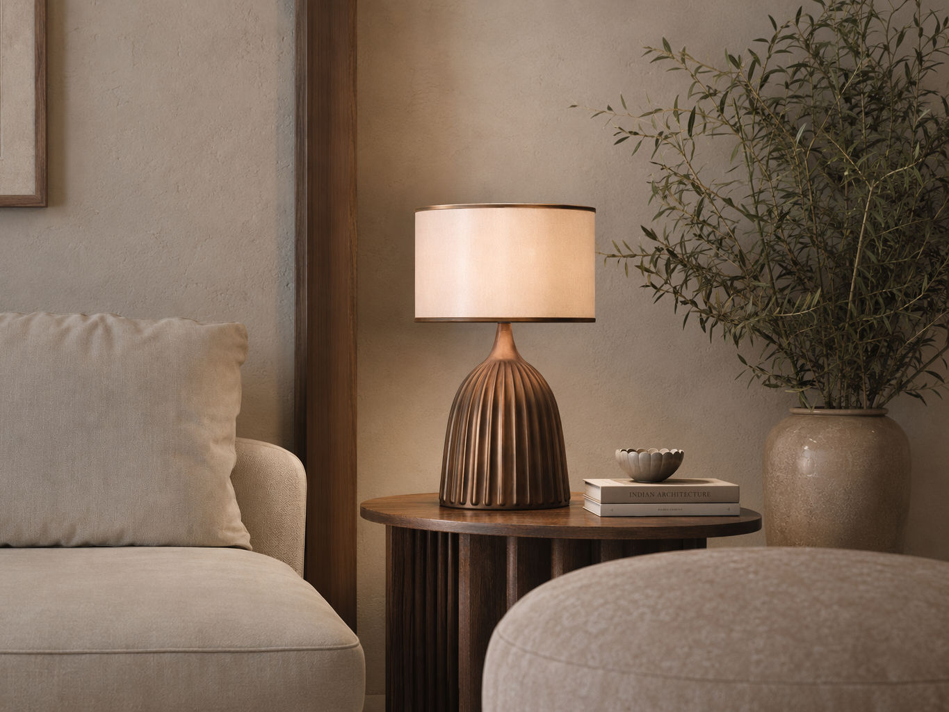 Table lamp with a ribbed bronze base and cream drum shade - Beautiful Homes