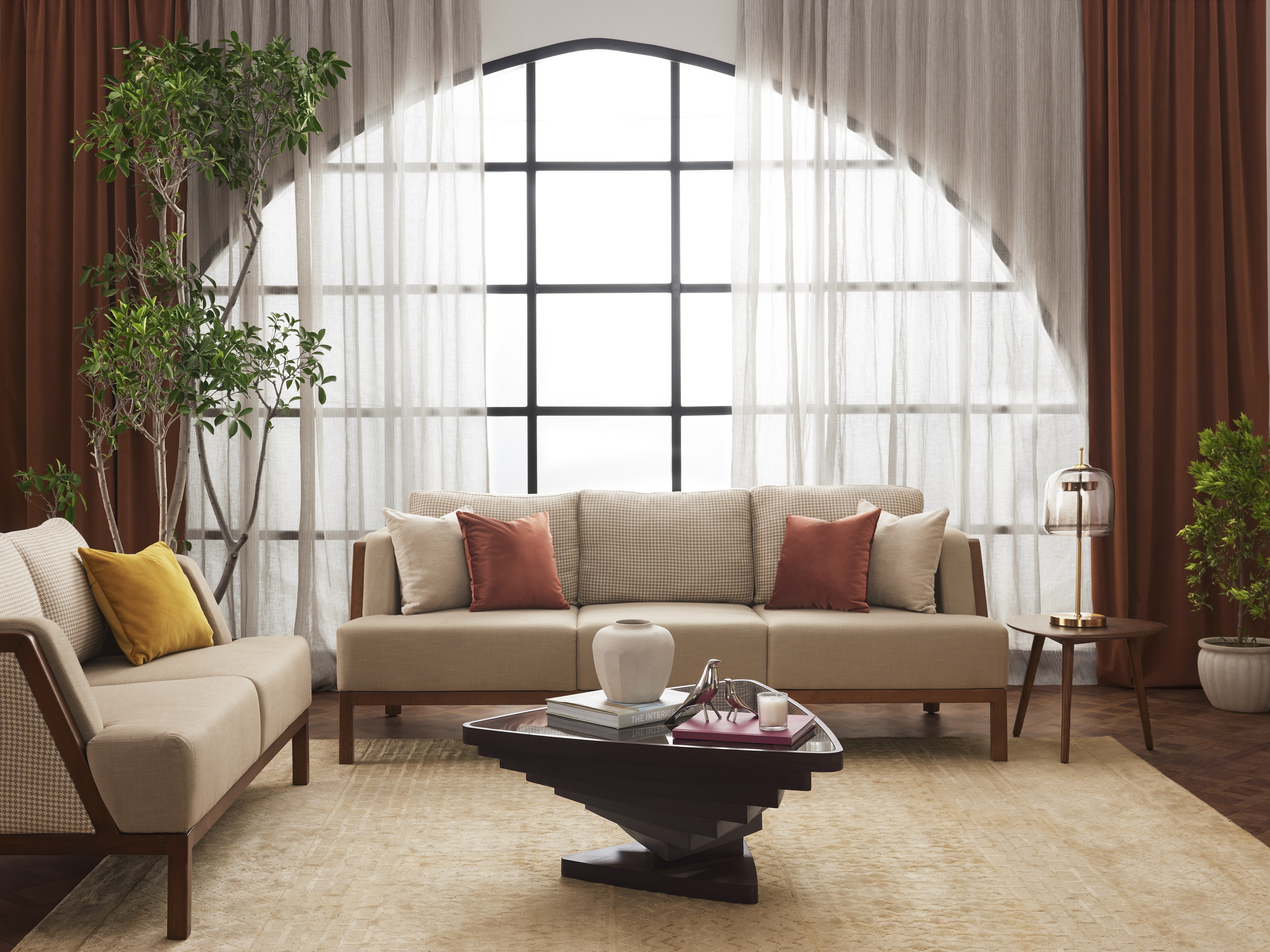 Modern living room with beige sofa and wooden table - Beautiful Homes