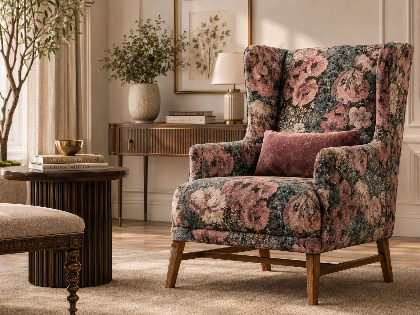 Wingback armchair upholstered in dusty pink, cream, and slate blue floral fabric with tapered wooden legs - Beautiful Homes