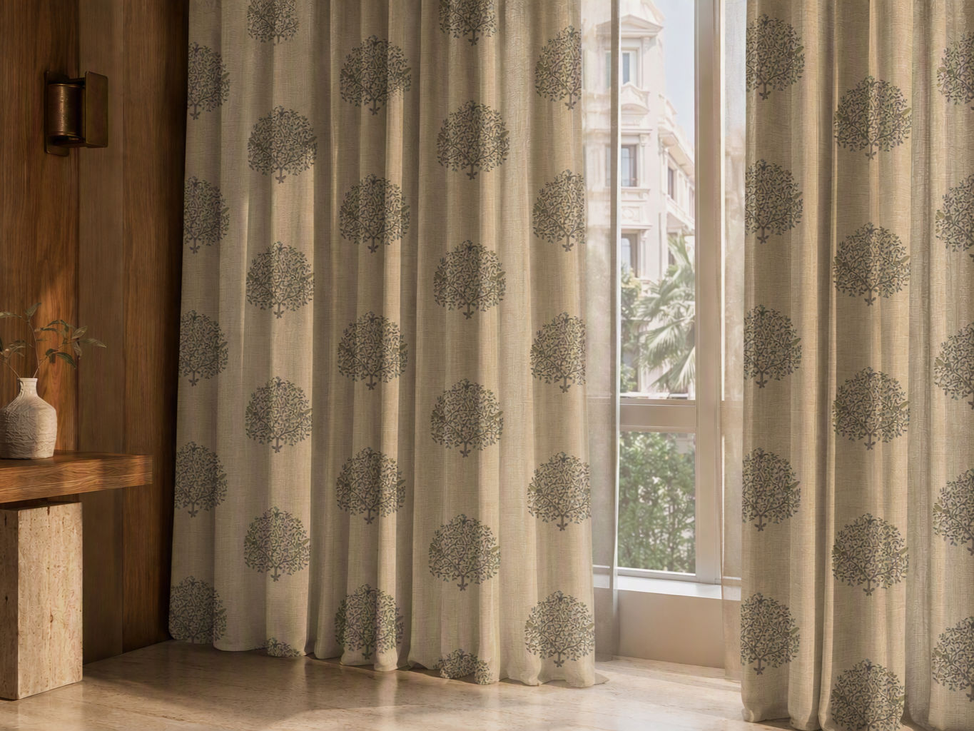 Window furnishing with full-length sheer linen curtains in a light beige tone,and detailed with repeating green tree motifs - Beautiful Homes