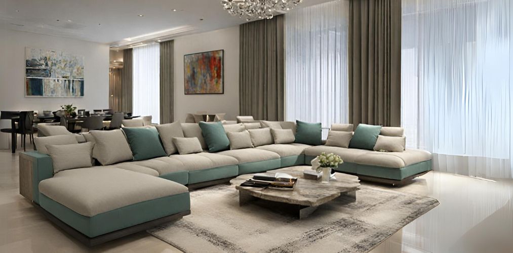 Living room with dual toned u-shaped sofa and carpet-Beautiful Homes