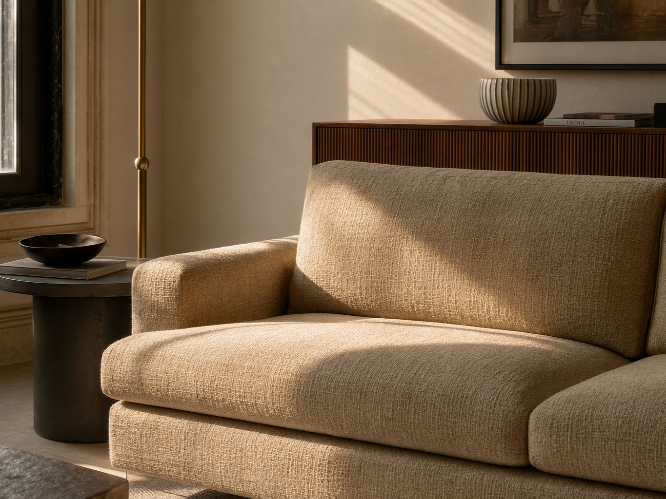 Beige sectional sofa with rounded cushions and richly textured woven upholstery - Beautiful Homes
