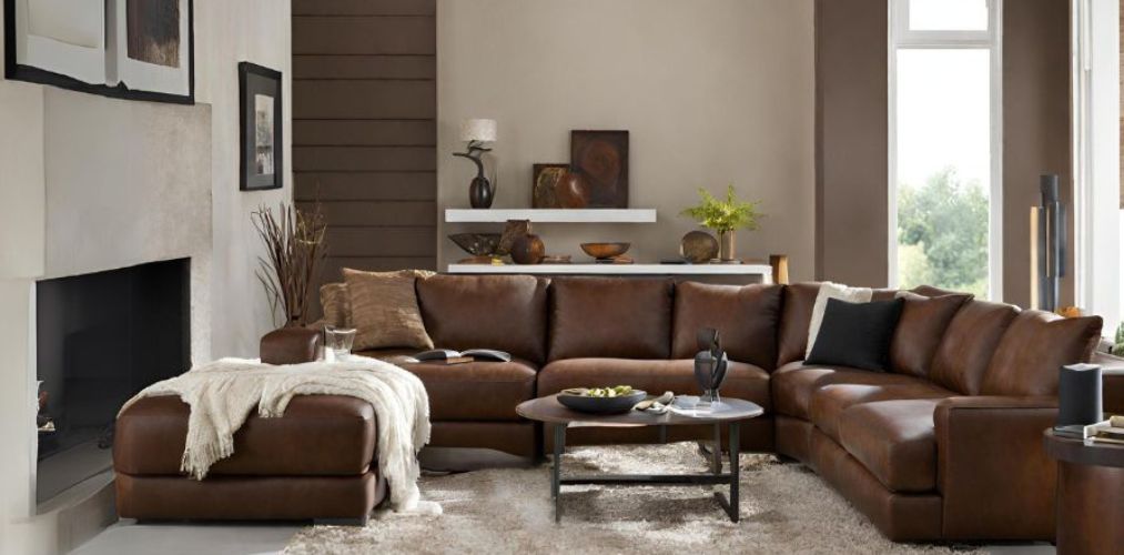 Modern living room with leather sectional sofa - Beautiful Homes
