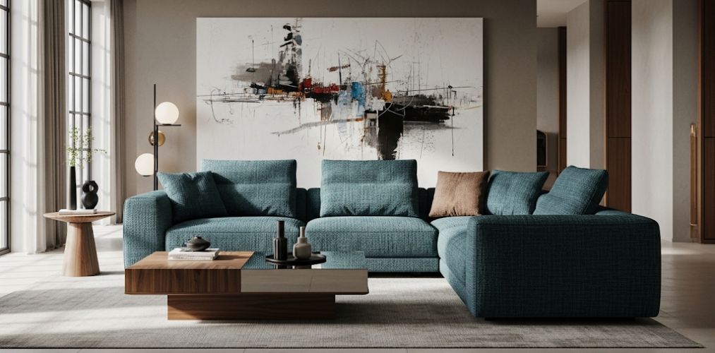 Living room with teal sofa and wooden table - Beautiful Homes