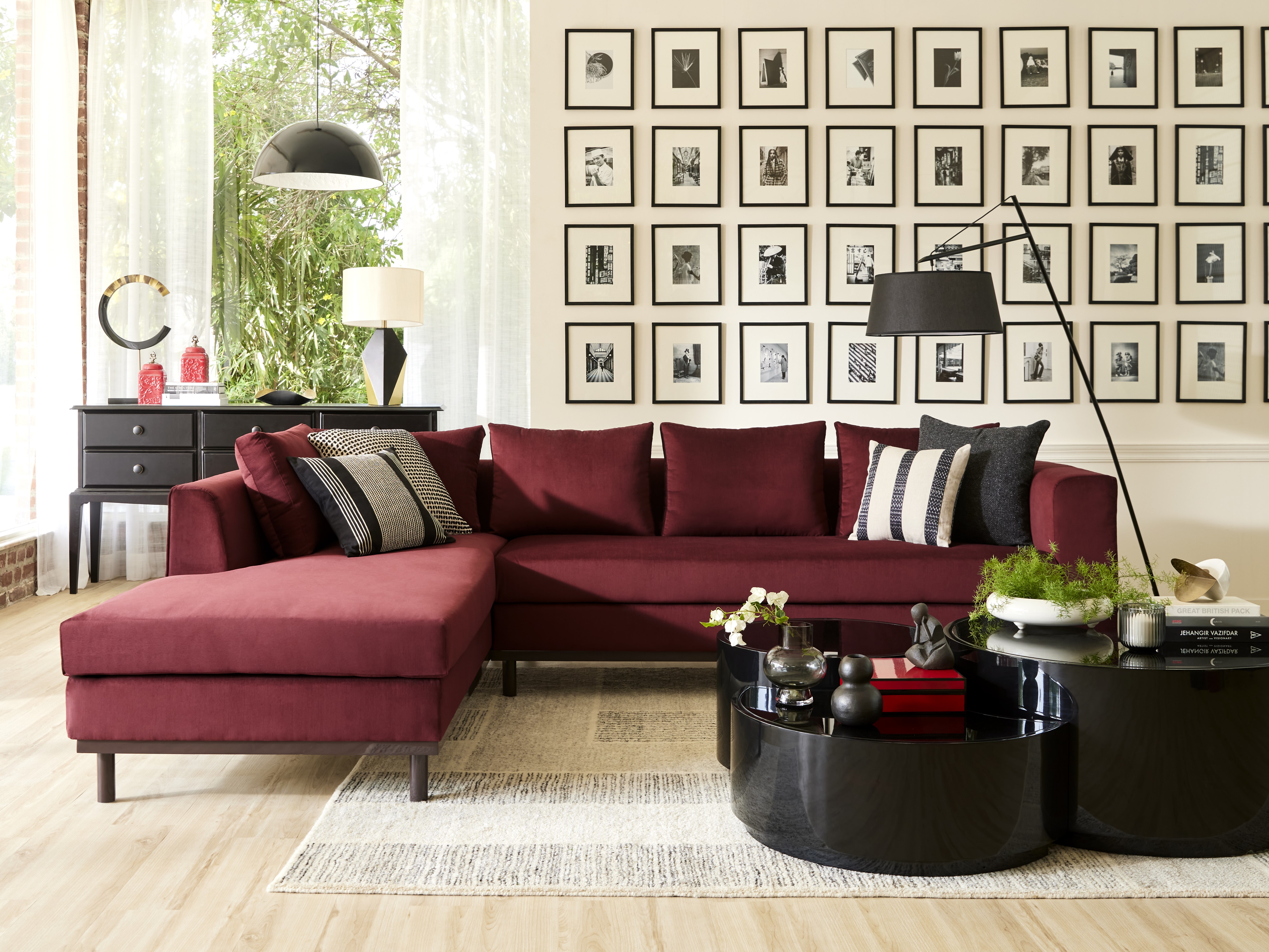 Modern living room with red sofa and sleek décor - Beautiful Homes