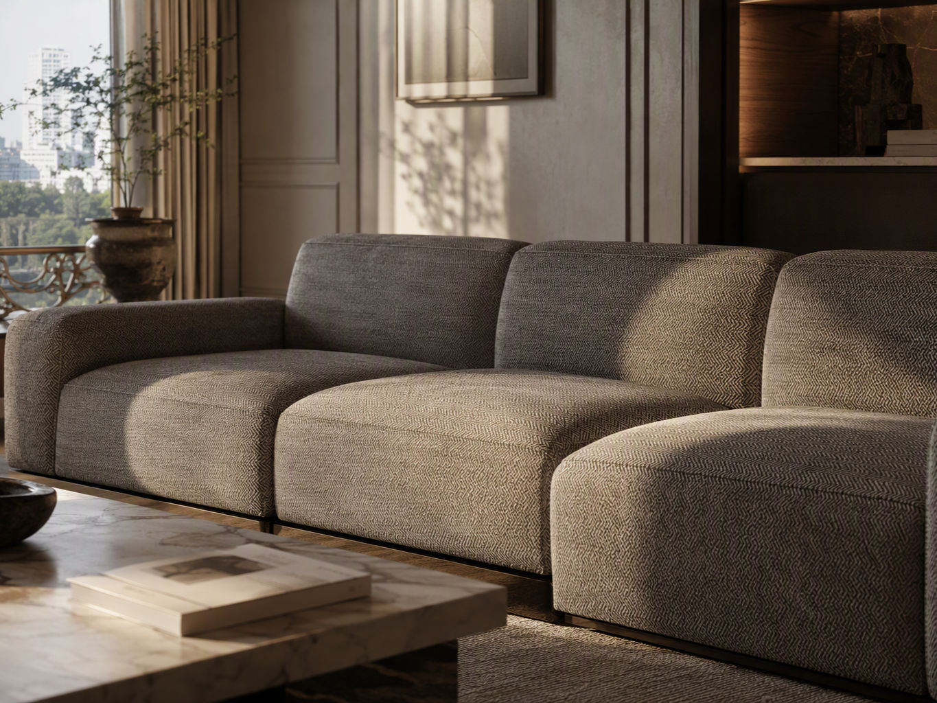 Low-profile modular sectional sofa upholstered in taupe and beige herringbone fabric - Beautiful Homes