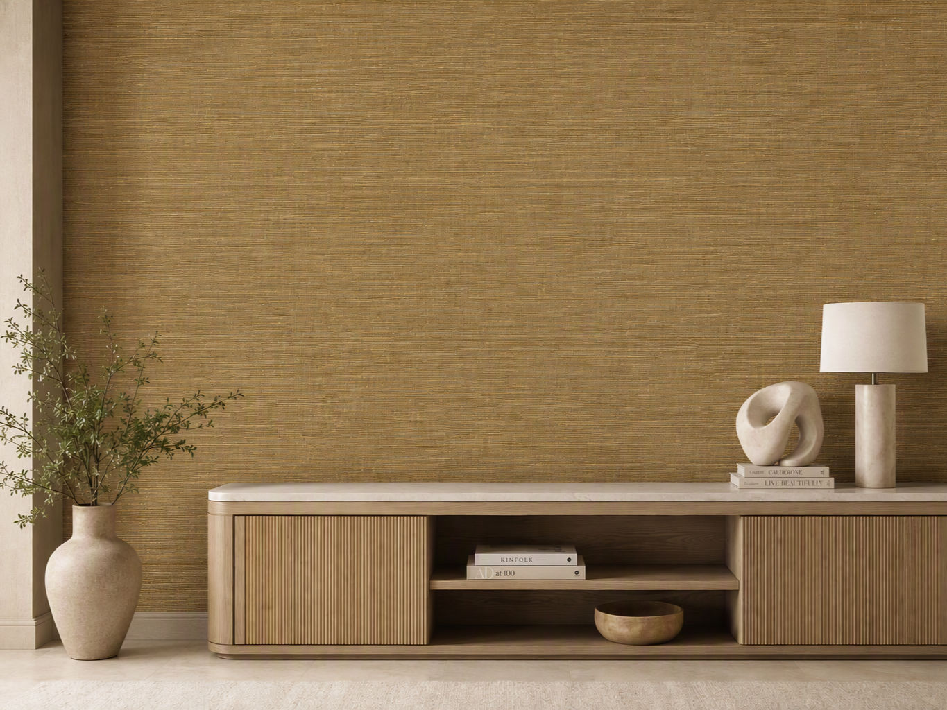 Warm mustard ochre grasscloth textured wallpaper behind a modern light wood console table - Beautiful Homes
