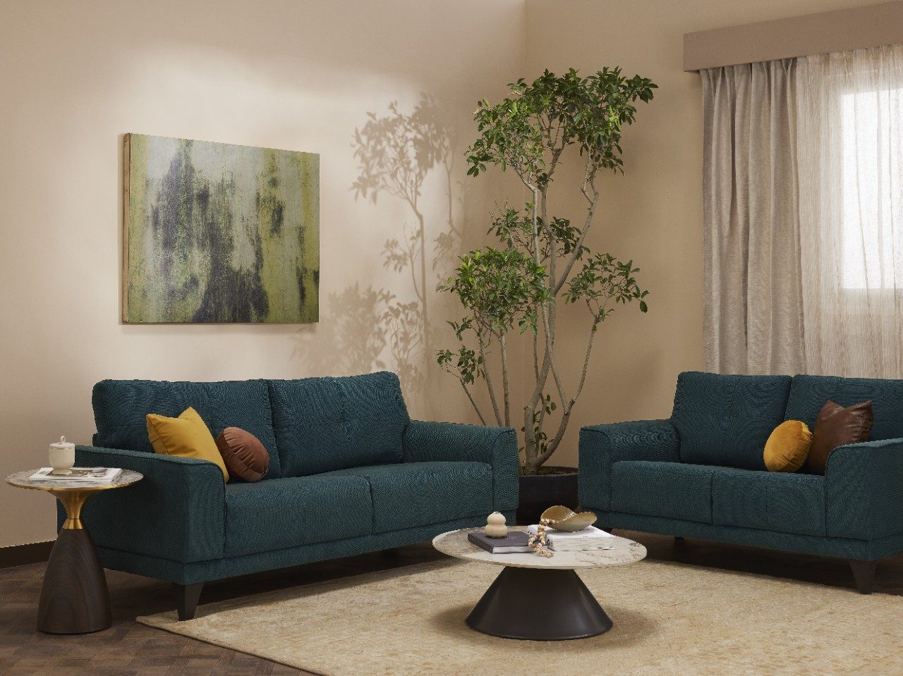 Modern minimalistic living room with teal upholstered sofa set and round center table - Beautiful Homes