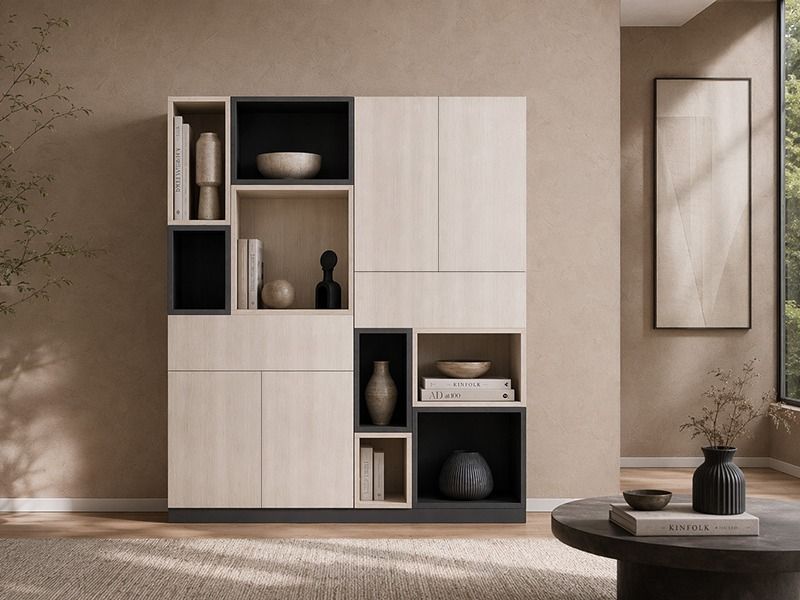 Bookshelf with a modular design in light wood and charcoal grey finishes, featuring open niches, and closed cabinets - Beautiful Homes