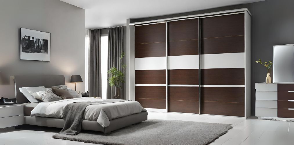 Minimal bedroom design with dual toned wardrobe - Beautiful Homes