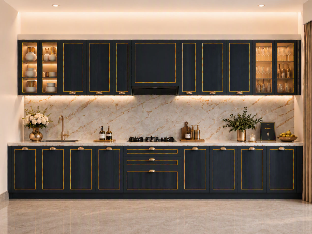 Modern straight kitchen with dark fluted cabinetry, gold trim and handles, white marble backsplash and countertop - Beautiful Homes