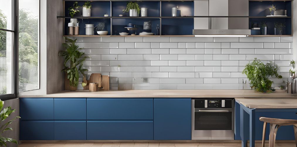 Contemporary blue modular kitchen with white subway tiles - Beautiful Homes