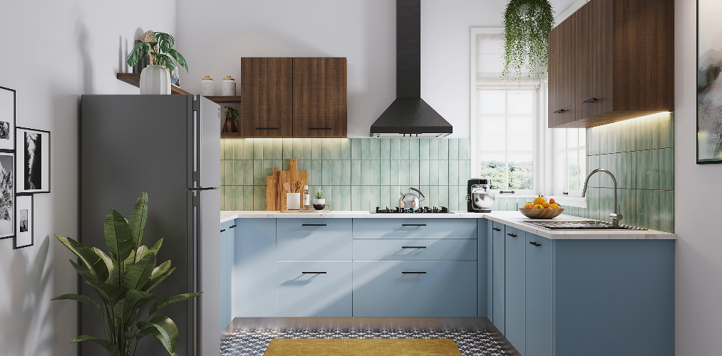 Cool hues of green and blue c shape kitchen design-Beautiful Homes