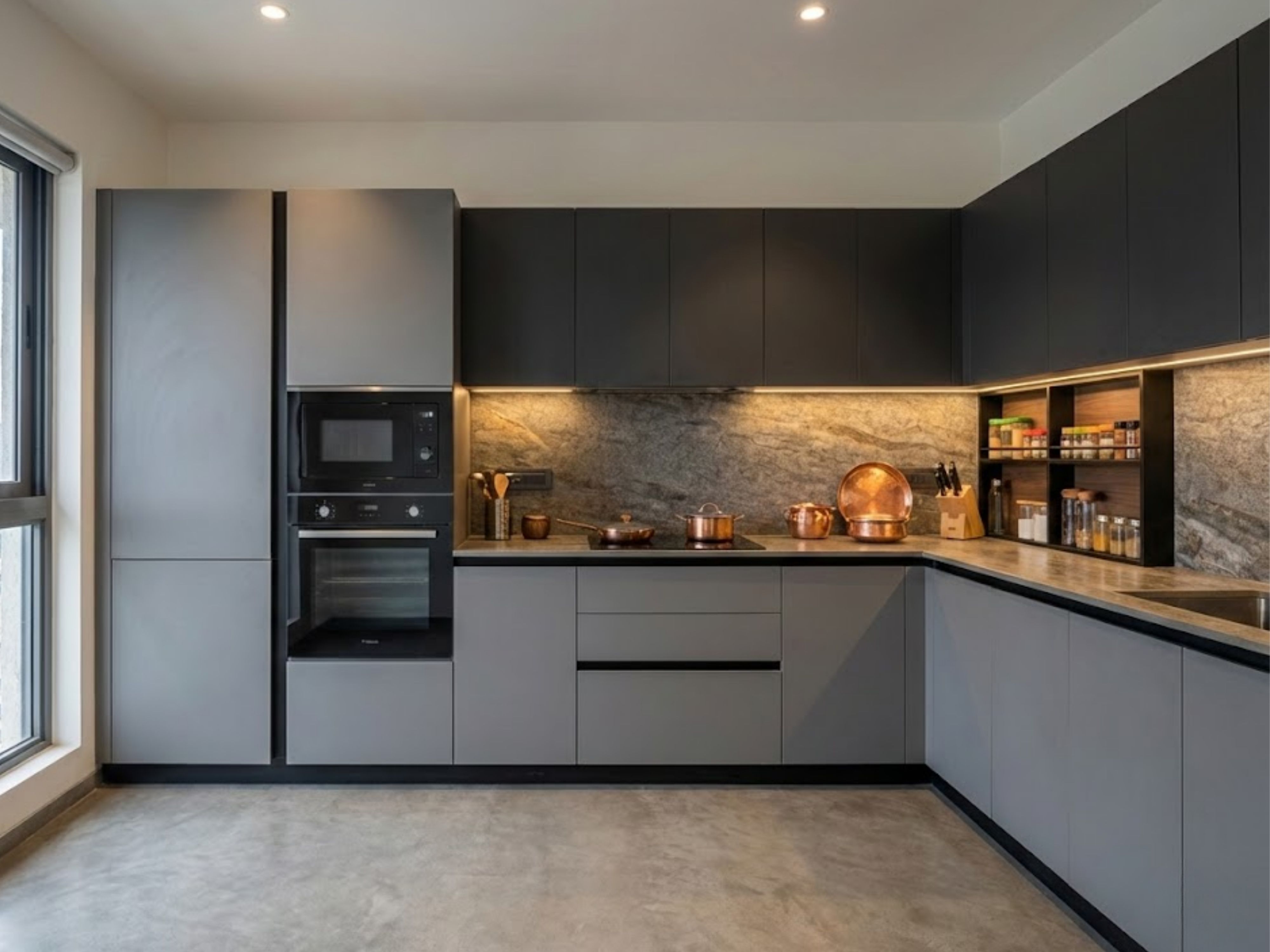 Modern L-shaped kitchen with grey cabinets and marble countertops - Beautiful Homes