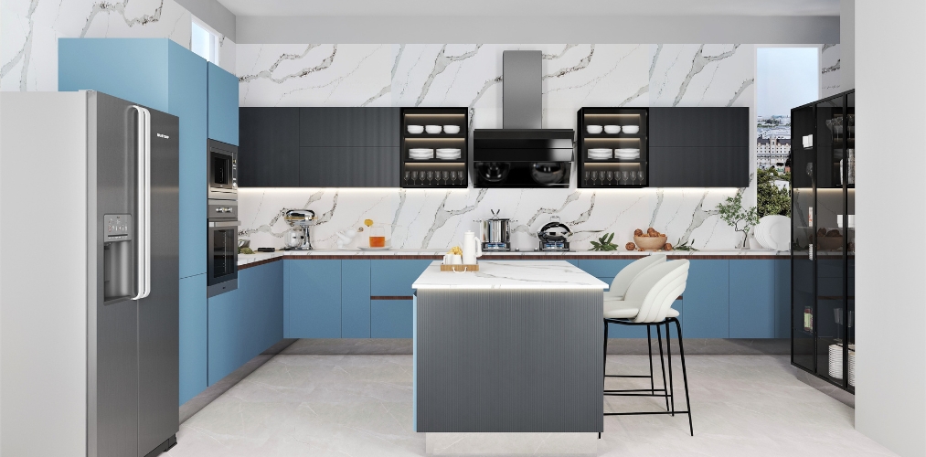 Kitchen with blue and black cabinetry and white marble backsplash-Beautiful Homes