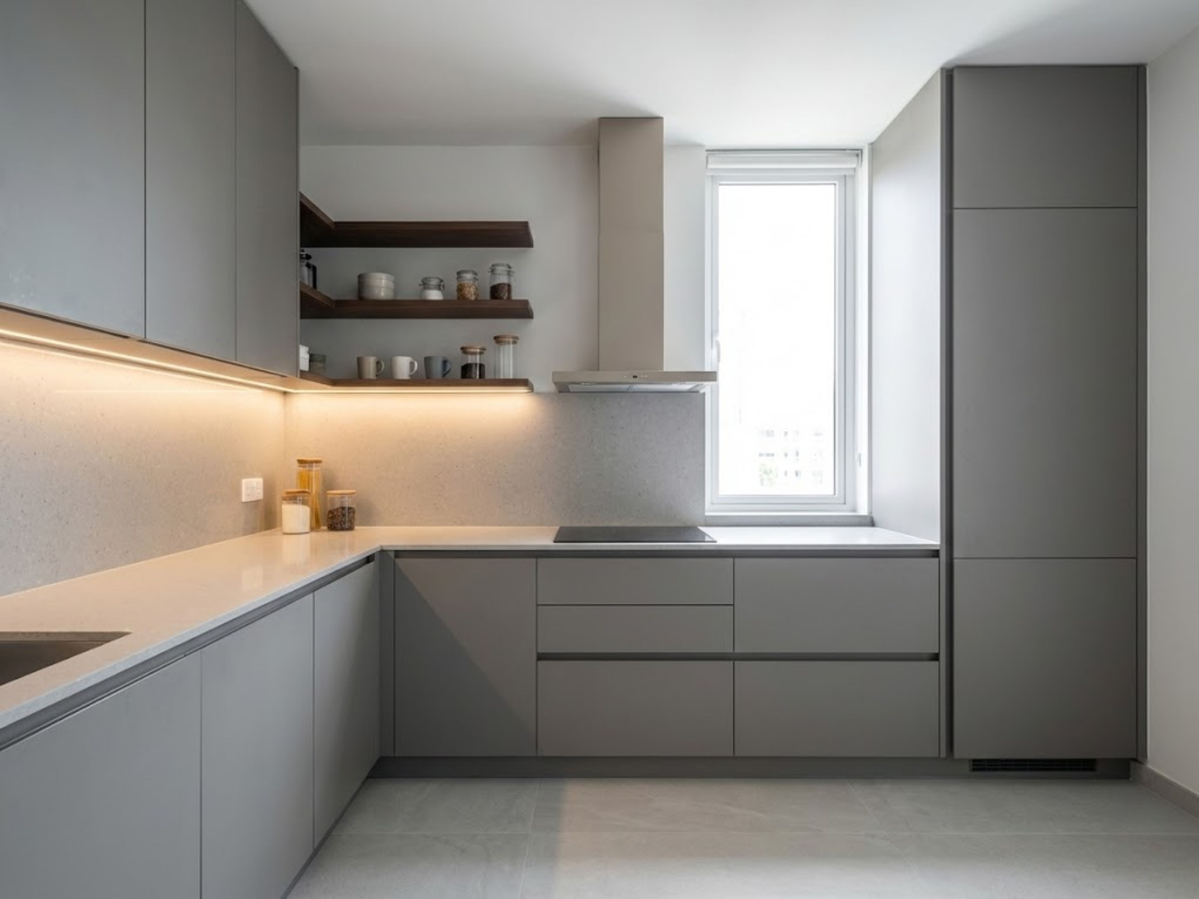 L-shaped kitchen with grey cabinets and natural light - Beautiful Homes