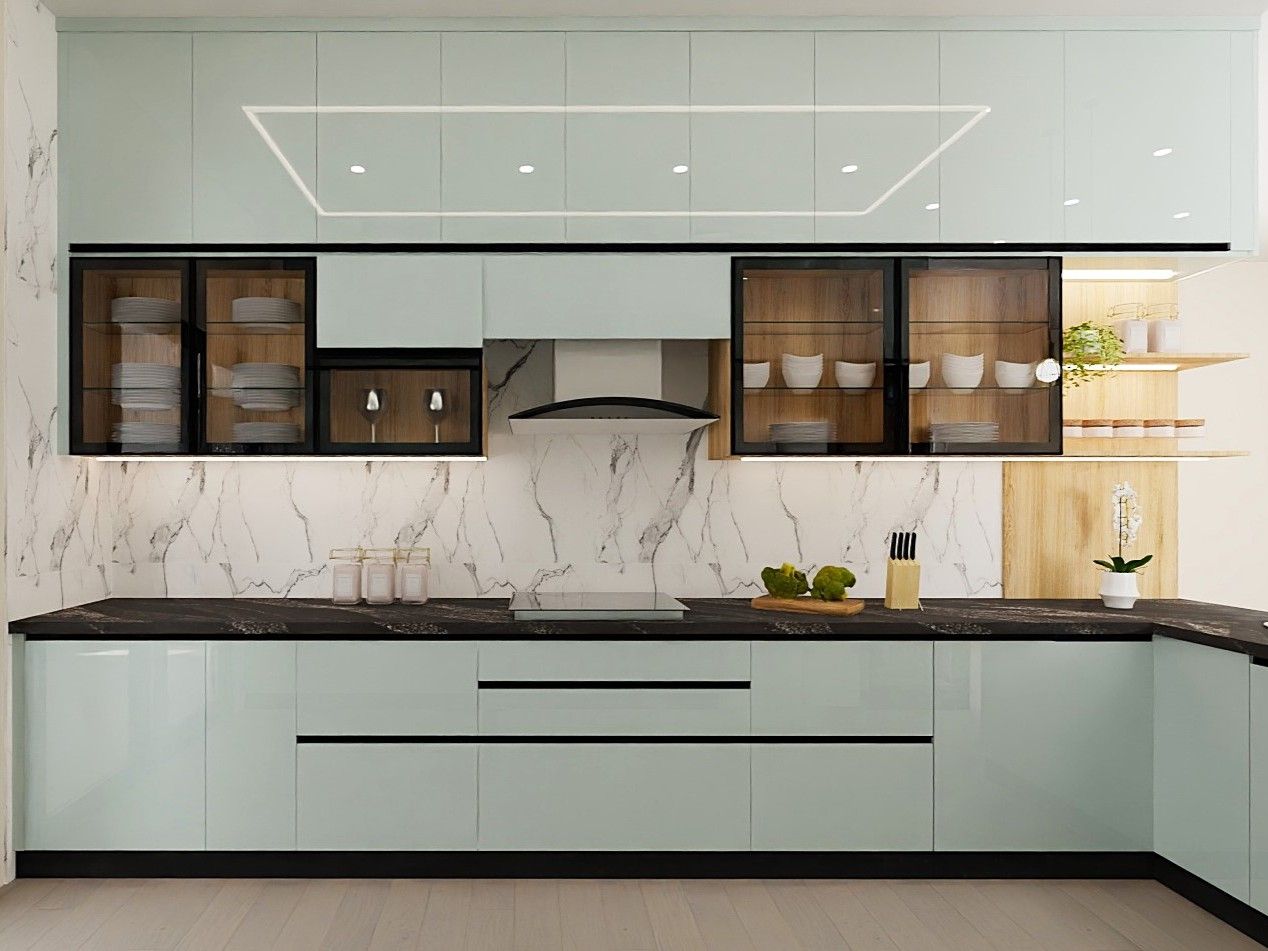 Contemporary kitchen featuring mint green cabinets, marble backsplash, and dark countertops - Beautiful Homes