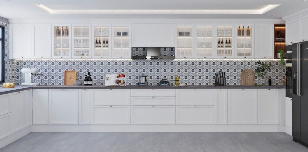 L shaped white kitchen with grey countertop-Beautiful Homes