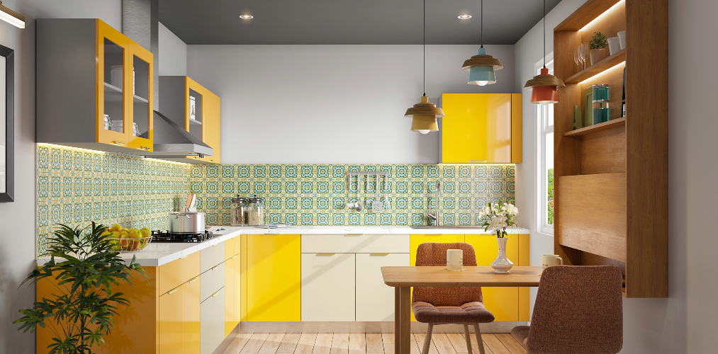 L shaped yellow & white kitchen design with designer kitchen tile-Beautiful Homes