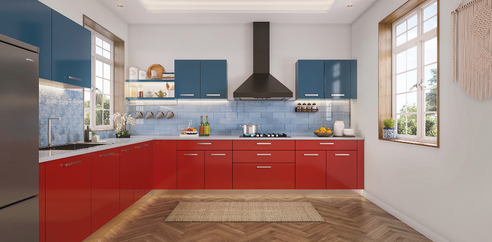 L-Type Kitchen Design with Blue Wall Tiles and Herringbone Floors-Beautiful Homes