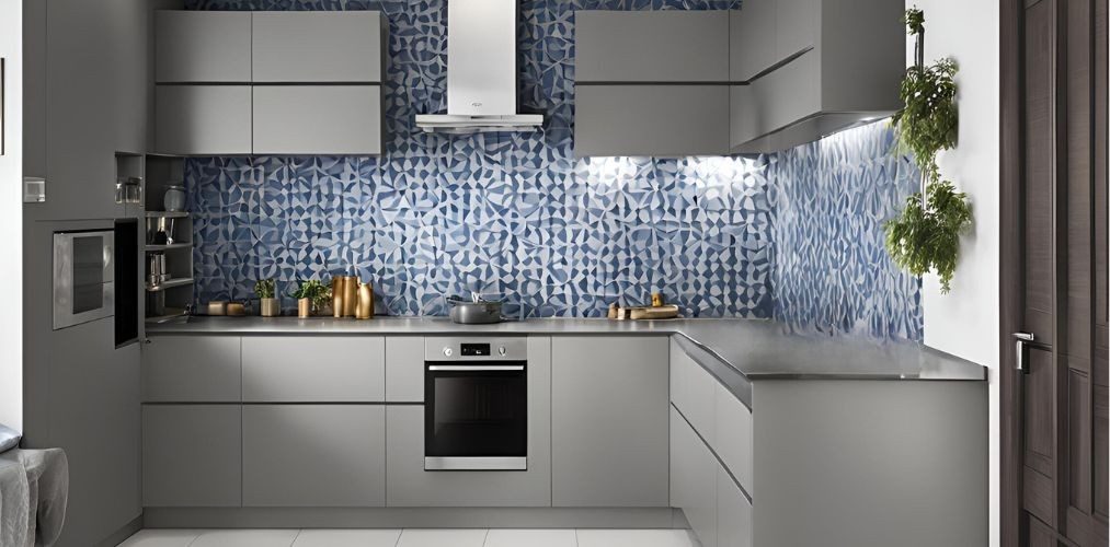 Modern grey kitchen design with blue white patterned backsplash - Beautiful Homes