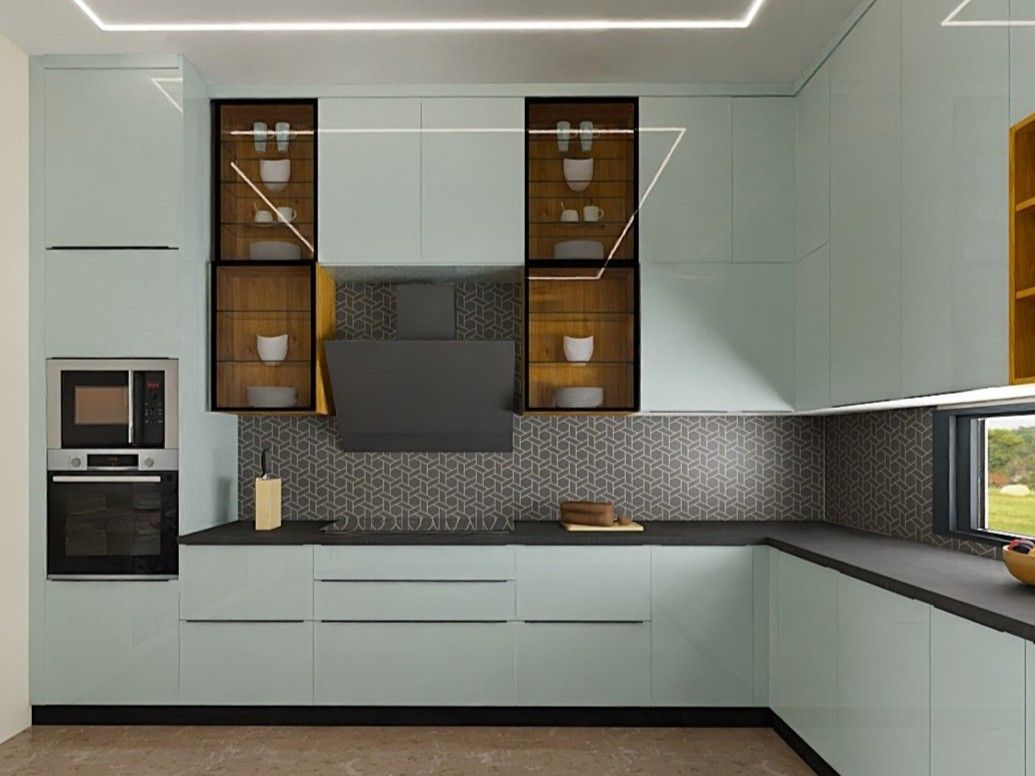 Contemporary L-shaped kitchen with light green cabinets, dark countertops, and a patterned backsplash - Beautiful Homes