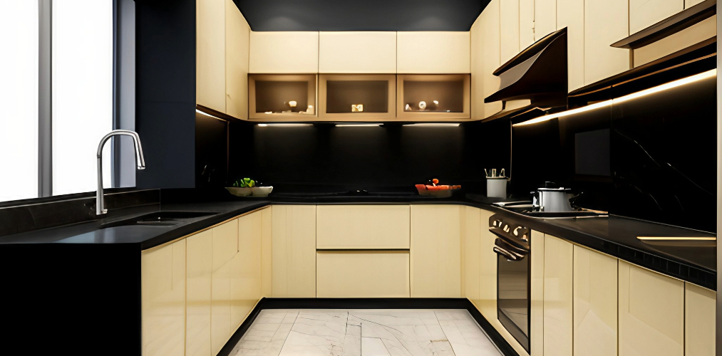Modular kitchen design with black marble countertop and cream color cabinets-BeautifulHome